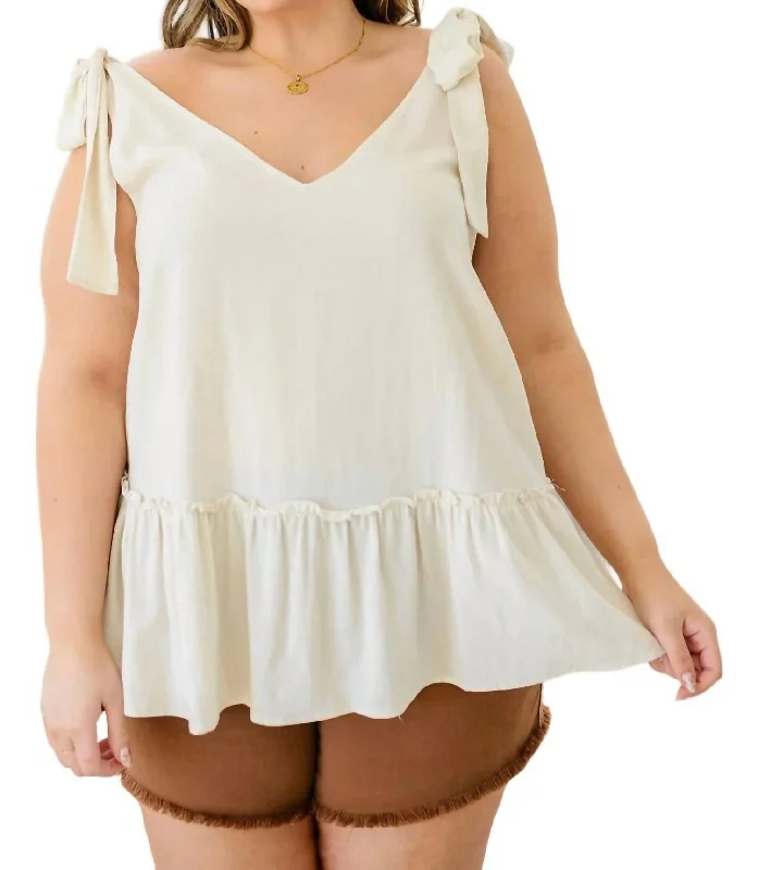 All Tied Up Peplum Tank In Ivory slim fit tank